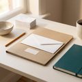 A kraft folder with an envelope, ready to hand off