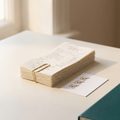 A tidy stack of receipts with a checklist card